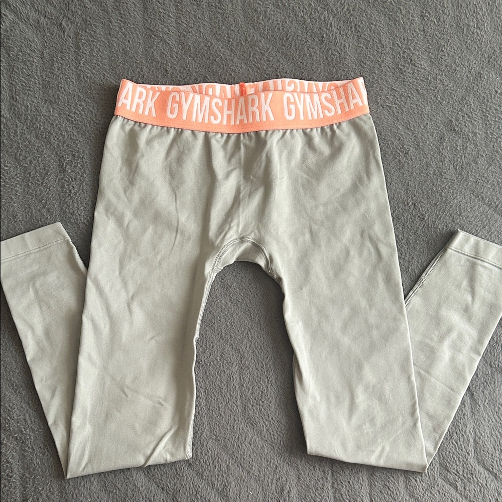 Women’s Gymshark size SM Light Gray Leggings with Peach Waistband